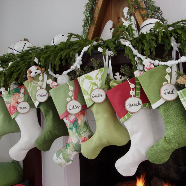 Festive Christmas stockings in bright colors of lime, kiwi and raspberry, and watermelon-- a modern twist on traditional Christmas.
